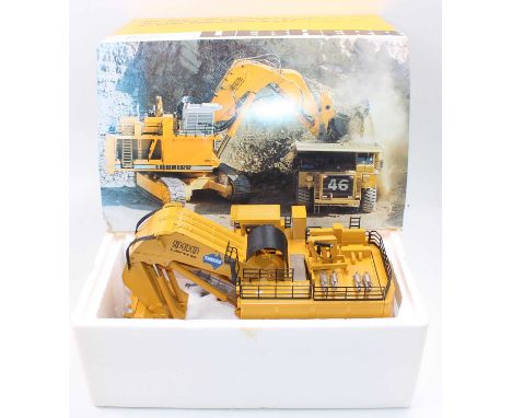 Conrad No.2811 1/50th scale diecast model of a Liebherr R966 Litronic Hydraulic Excavator, finished in yellow with Theiss Liv