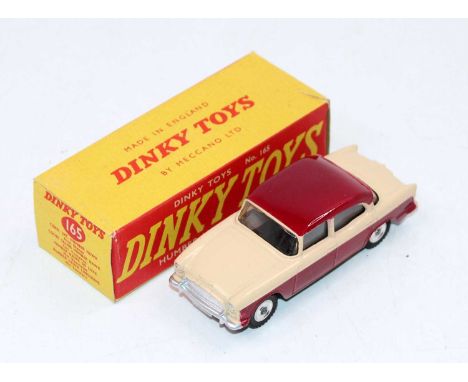 Dinky Toys No. 165 Humber Hawk consisting of maroon lower body and roof, with light beige upper body and spun hubs, in the or