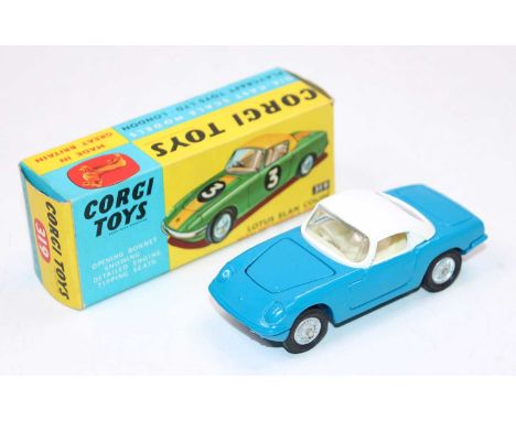 A Corgi Toys No. 319 Lotus Elan Coupe finished in blue and white with detachable chassis, fitted with cast wirework hubs, hou