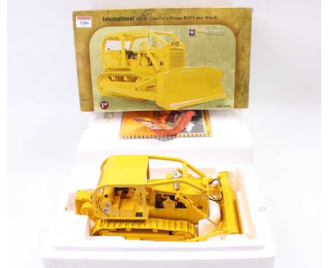 First Gear No.79-0182 1/25th scale diecast model of a USDA Forestry Service International TD25 Crawler with Sweep ROPS and wi