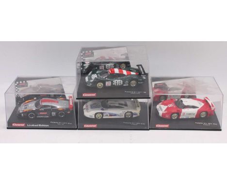 4 boxed Carrera 1/32 scale Porsche 911 GT1 slot cars including, No. 25412 in green with Zakspeed racing livery, No. 25401 Le 