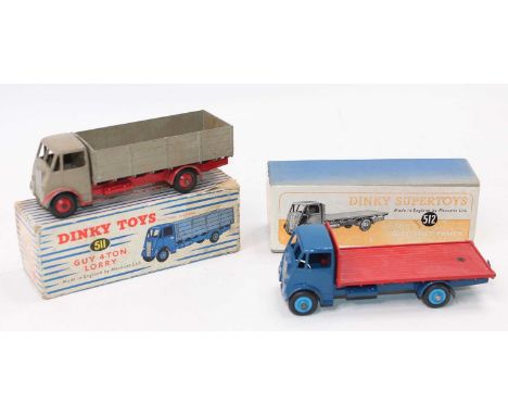 2 boxed Dinky Toys Guy trucks as follows: 511 guy 4-ton lorry comprising of fawn cab and back with red chassis and matching h