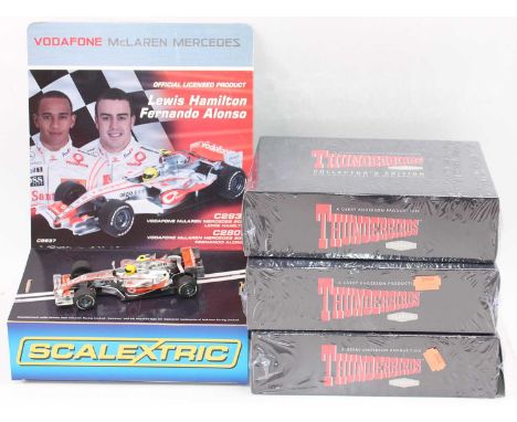 1 box containing 3 boxed atlas models of Gerry Anderson Thunderbirds series, 2 of which are sealed and 1 has been opened at o