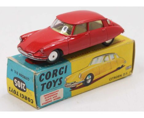 A Corgi Toys No. 210 S Citroen DS19 comprising of red body with yellow interior, fitted with flat spun hubs, housed in the or