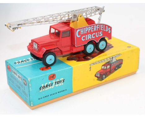 A Corgi Toys No. 1121 Chipperfield Circus crane truck comprising of red &amp; light blue body with silver crane jib, housed i