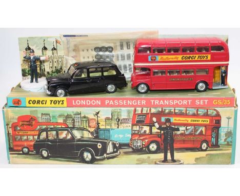 A Corgi Toys Gift Set No. 35 London Passenger Transport set comprising of London Routemaster bus and taxi cab with standing p