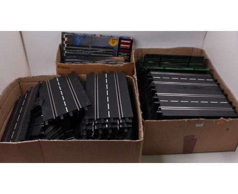 3 boxes of Carrera Exclusiv Slot Racing Track, various sections included