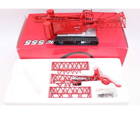 A Classic Construction Models 1/50 scale diecast model of a Manitowoc 555 crawler crane finished in red with black detailing 