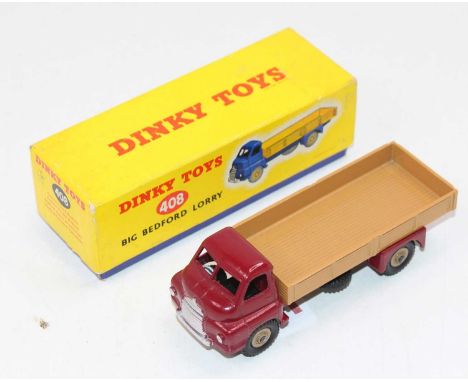 Dinky Toys, 408 Big Bedford lorry, maroon cab and chassis, light tan back with cream hubs, in original lidded all card box, (