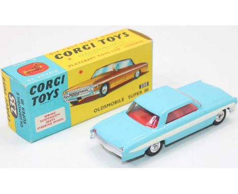 A Corgi Toys No. 235 Oldsmobile Super 88, finished in light blue with white stripe and red interior, fitted with spun hubs an