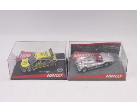 2 boxed Ninco 1/32 scale slot cars to include No. 50393 Renault Megane NSCC limited edition 2006 and No. 50465 Jaguar XK120 i