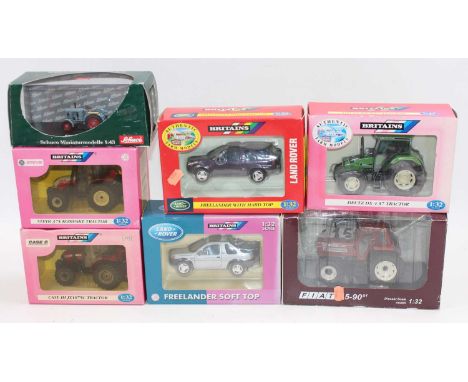 Seven various boxed Britains Schuco and Replicagri 1.32 scale farming vehicles and attachments, to include a Britains Case IH