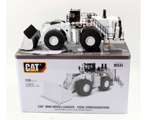 Diecast Masters Real Replicas, 1/50th scale diecast model of a CAT 994K Wheel Loader, finished in white, housed in the origin