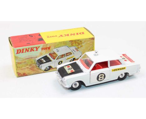 Dinky Toys No. 212 Ford Cortina Rally Car comprising of white and black body with red interior and spun hubs with various adv