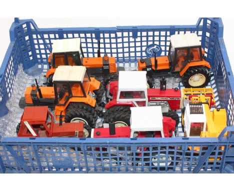 One tray containing a quantity of various mixed Britains farm tractors and implements to include a Massey Ferguson 2680, a Re