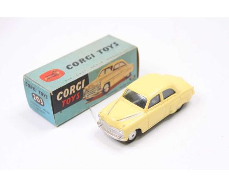 Corgi Toys, 203, Vauxhall Velox Saloon, yellow body with silver detailing, glazing and spun hubs, in the original blue ground