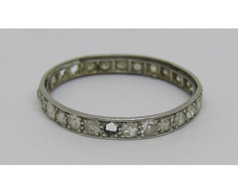 White metal diamond eternity ring, size P, 1.8g (worn, four diamonds vacant) 