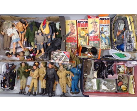 A large collection of unsorted vintage Action Man figures and accessories including 8 complete figures (all with flock hair, 