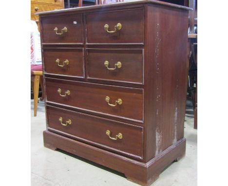 A good quality reproduction hardwood chest of two long and four short drawers, a further tower of four drawers with ring hand