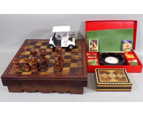 Collection of toys and games including a large hand crafted chess set, made in Bristol in 1988, with chess pieces based on Am
