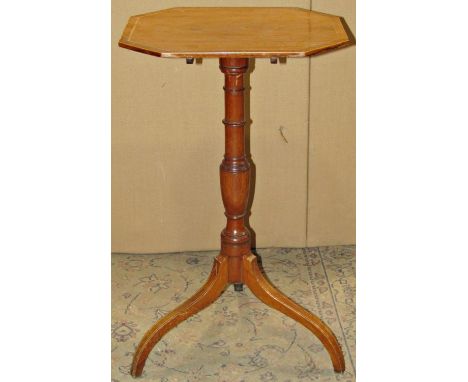 Small Georgian mahogany snaptop table, the octagonal top raised on a turned pillar and tripod 