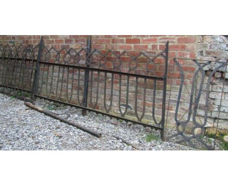 A run (three sections) of iron railing with decorative repeating interlaced strapwork design, approximately 20 ft long (full 