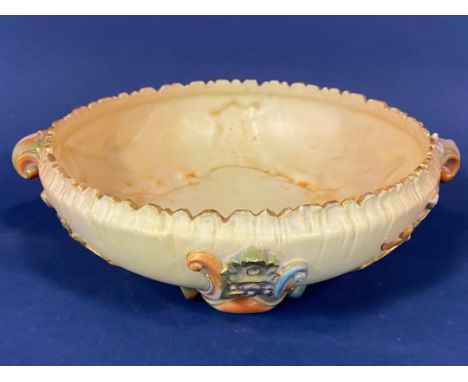 A Royal Worcester two handled bowl with applied stylised leaf detail on a blush ivory ground, with puce printed marks to base