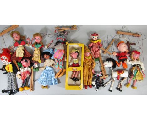 Collection of vintage puppets including boxed Pelham Pinocchio, unboxed cat, mule, clowns, Minnie Mouse, wolf etc (most by Pe