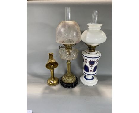 Brass Corinthian column oil lamp with glass reservoir, further opaline oil lamp and a further lantern (af) (3) 