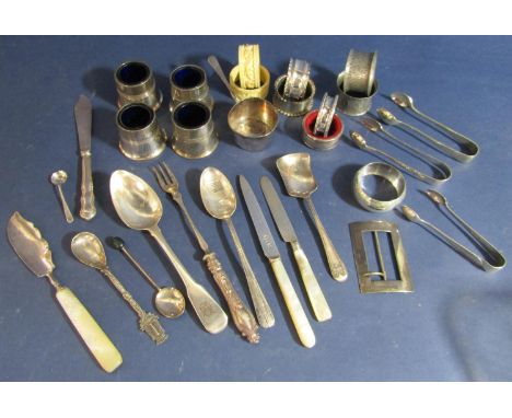 A mixed collection of silver and silver plate comprising napkin ring, sugar nips, fruit knives, etc 