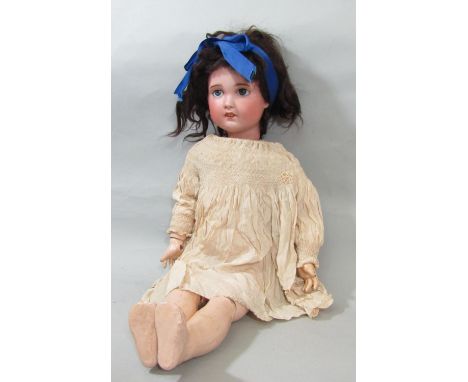 Early 20th century French bisque head by SFBJ with blue eyes (fixed open), open mouth with teeth, pierced ears, jointed compo