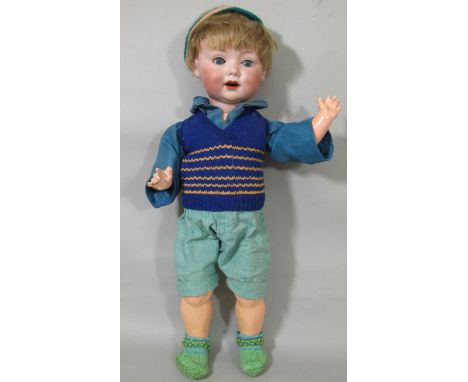 Bisque head character doll by George Borfeldt/ Armand Marseille, with blue closing eyes, open mouth with teeth, 5 piece body 