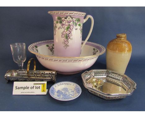 A stoneware single handled jar with impressed mark H &amp; A Perrett Wotton-under-Edge and numbers 559, 22 cm tall approximat