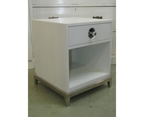 A set of four contemporary bedside or lamp tables by Jonathan Adler in white wood and chrome 