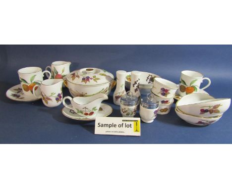A quantity of Royal Worcester Evesham pattern wares including a pair of condiments, serving dishes, vegetable dishes and cove