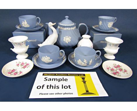 A quantity of Wedgwood blue ground jasperwares (mostly boxed) including a teapot and cover of fluted form, a cup and saucer o