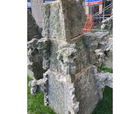(2 of 3) An early 17th century Oolitic limestone pinnacle with Crocket detail, approximate height 2 metres, base 65 x 65 cm a