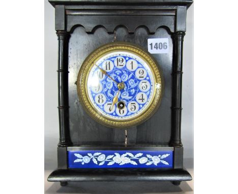 Good arts and crafts ebonised mantel clock with blue and white ceramic dial and painted Arabic numerals, single train movemen