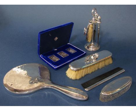 Mixed collection of silver comprising a hung companion manicure set, a dressing brush, comb and mirror, a silver lidded powde
