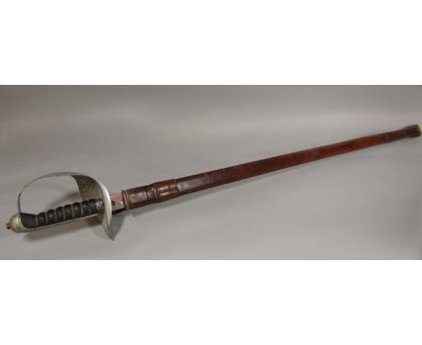 George VI infantry officers sword with leather scabbard 