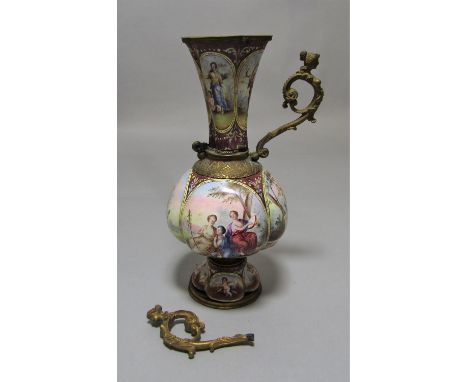 A 19th century continental enamelled vase, the lobed body with four panels showing cupid at work, the trumpet shaped foot and