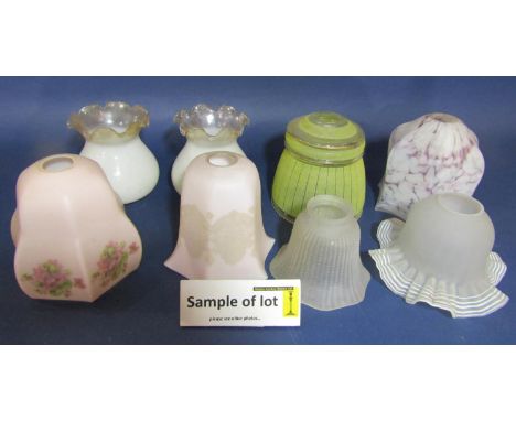 A large collection of various vintage glass light shades 