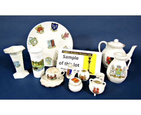 A quantity of various WH Goss crested wares including hair tidies, teapot, hat pin holder, numerous vases and vessels, etc (c