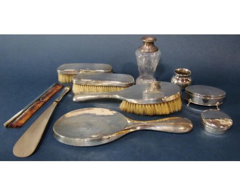 Good silver applied dressing set comprising hand mirror, three brushes, silver topped comb, shoe horn, jewellery box, pill bo