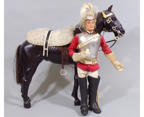 Vintage Action Man with gripping hands and flock hair, fully dressed in Household Cavalry uniform and sword, with horse compl