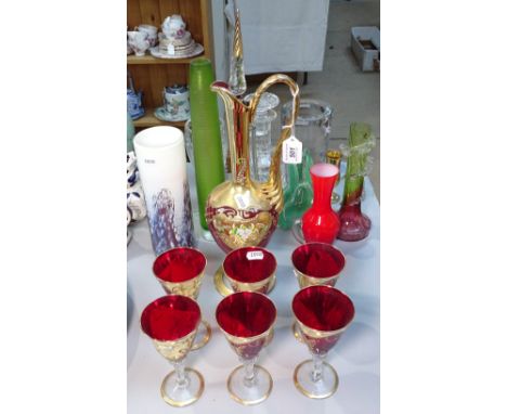 A Venetian gilded and enamelled glass decanter set