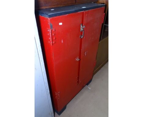 A Vintage red painted metal cabinet, with 2 doors and fitted pine shelves, and stained pine top, W69cm, H112cm