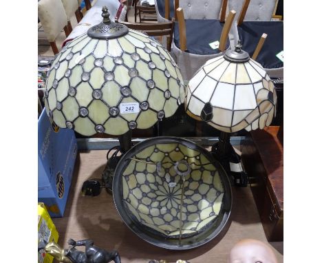 A table lamp with lead light glass shade, matching ceiling light bowl, and a similar small table lamp