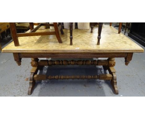 A Continental oak and cubed parquetry top dining table, raised on baluster turned legs, and bobbin turned stretchers, L147cm,