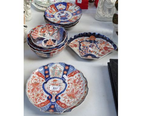 A pair of Imari shell design dishes, and other Imari bowls and plates